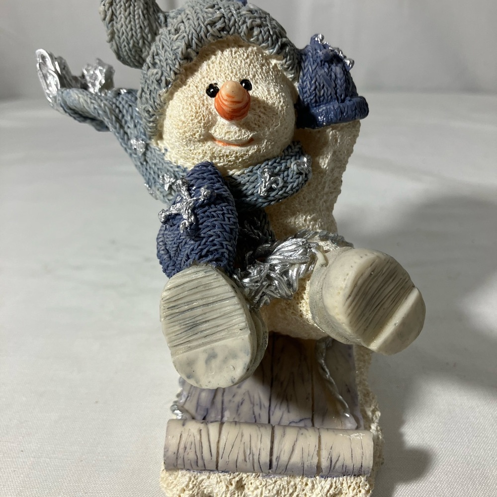 Cornerstone Creations Cozy Snowman on Sled Holiday Figurine - Blue and Cream